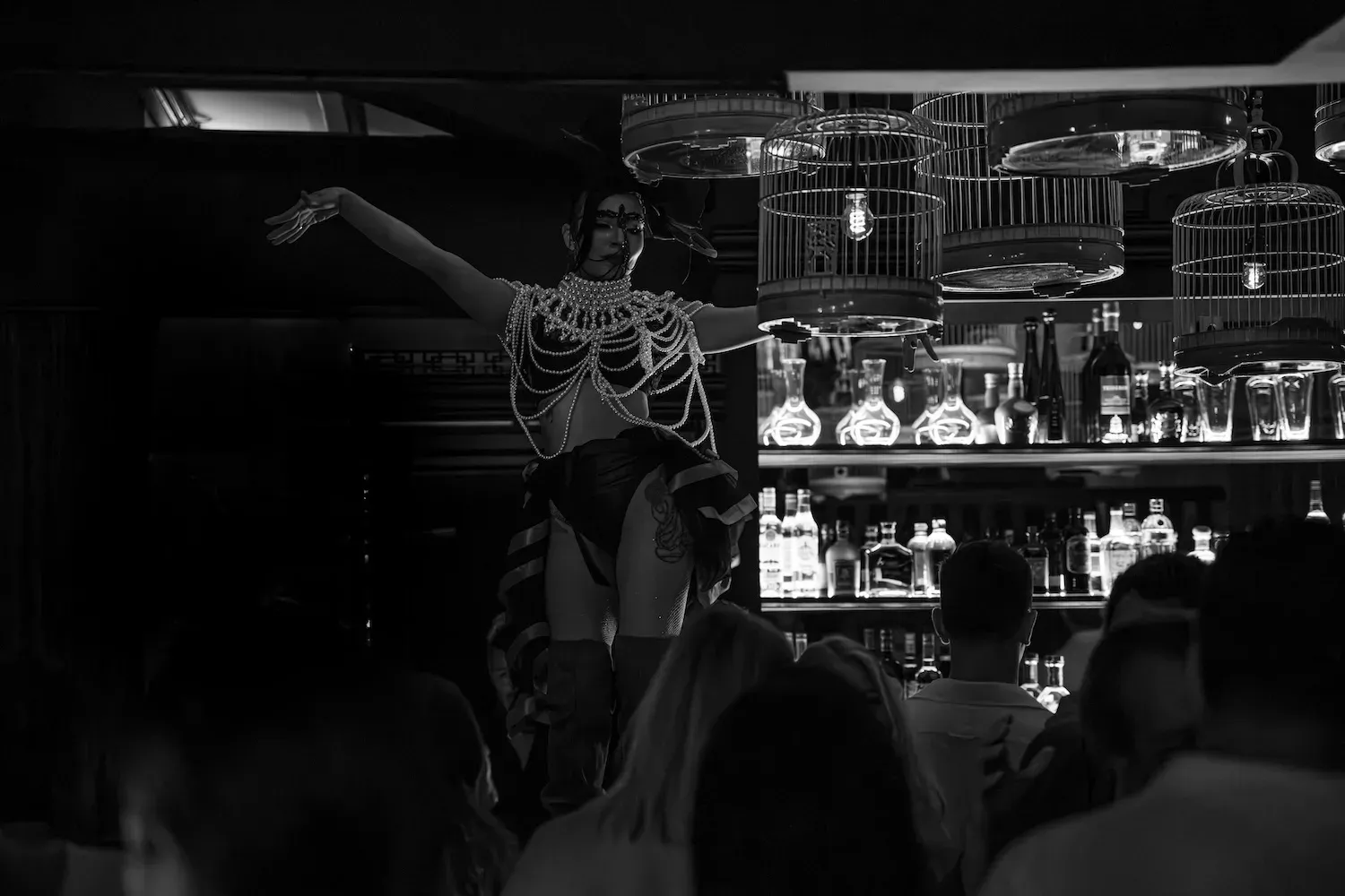 A burlesque performer at Madame Claude